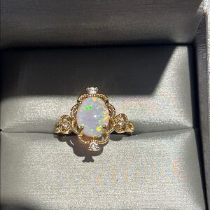 Elegant Gold Opal Ring with Diamond Accents